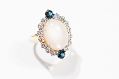 Moonstone, diamonds and blue topaz ring