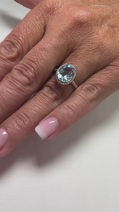 Baby Blue Topaz Ring with Diamonds 10k white gold