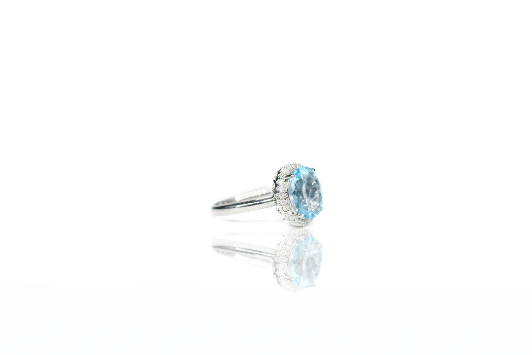 Baby Blue Topaz Ring with Diamonds 10k white gold